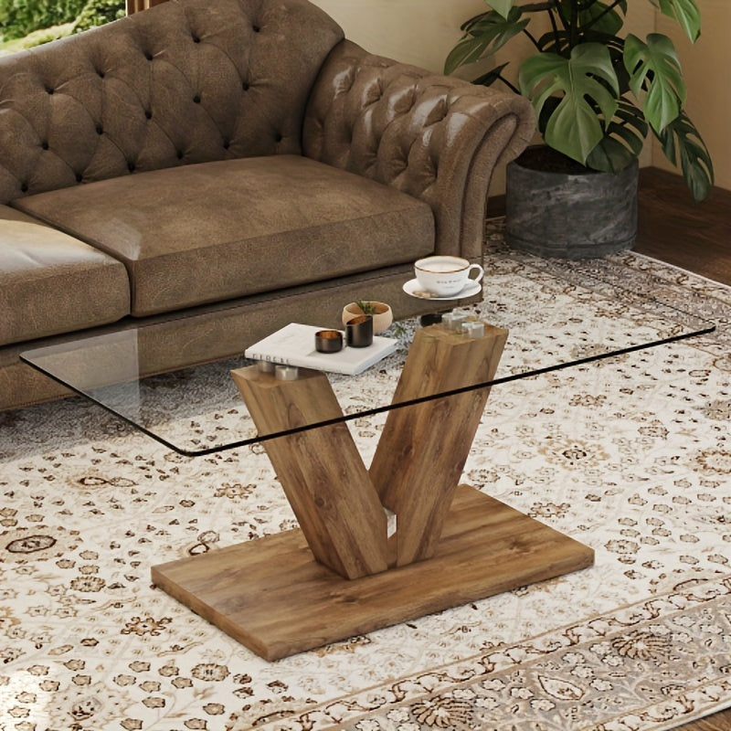 A modern minimalist style coffee table. Transparent tempered glass tabletop with columns. Suitable for living room and dining room